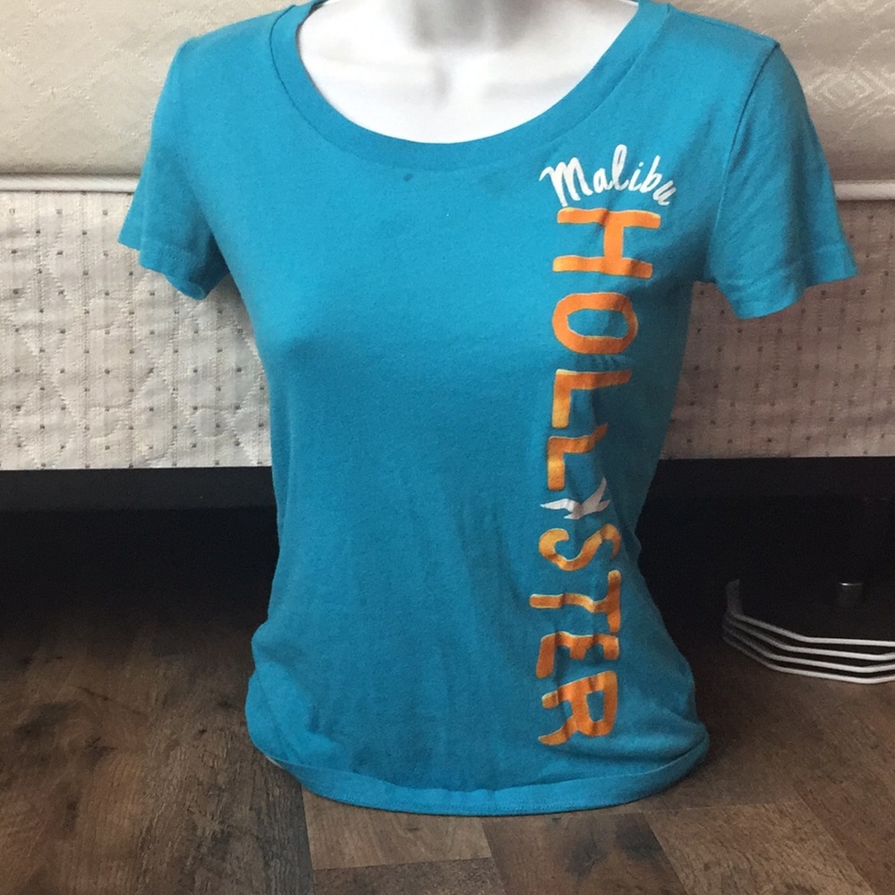 A blue and orange hollister t-shirt